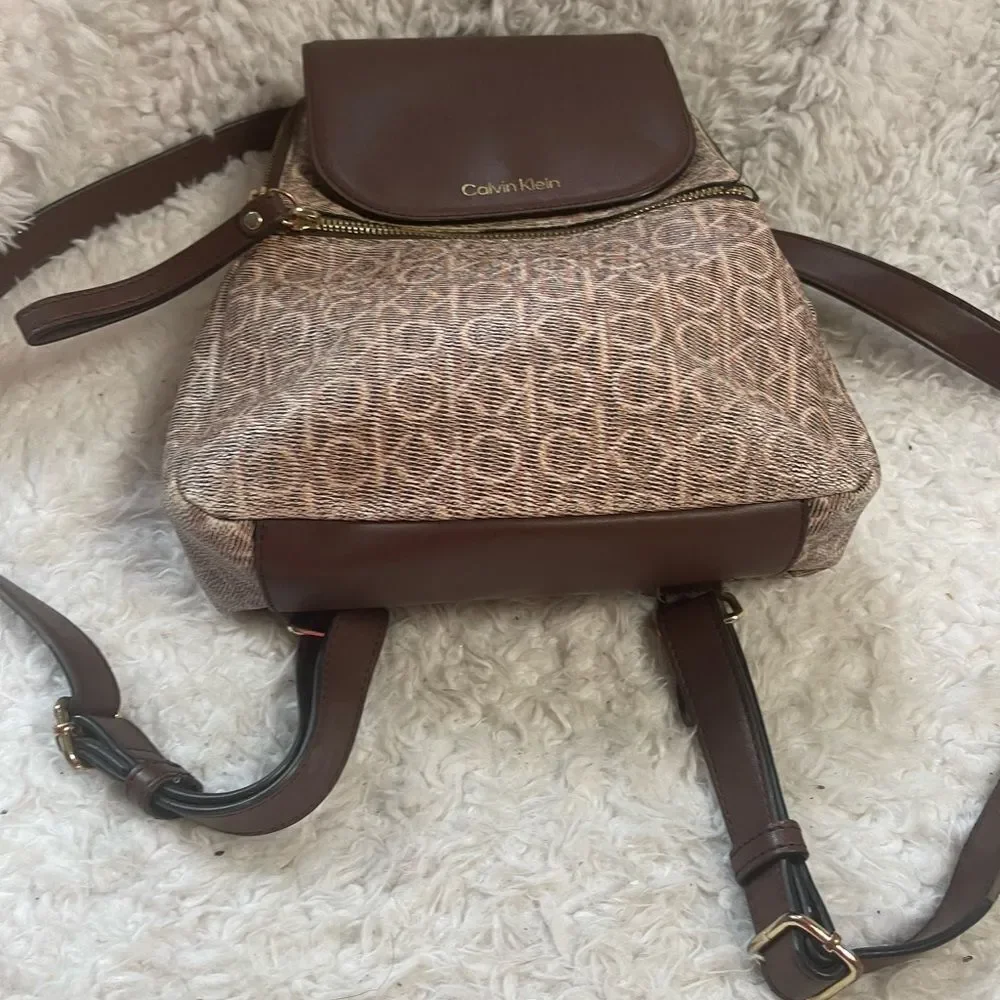 Calvin Klein Tan and Brown Logos  small Backpack logo tone hardwares.